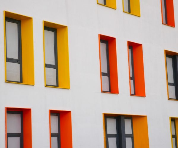 close-up-of-colorful-buildings-with-modern-window-2023-11-27-05-27-46-utc